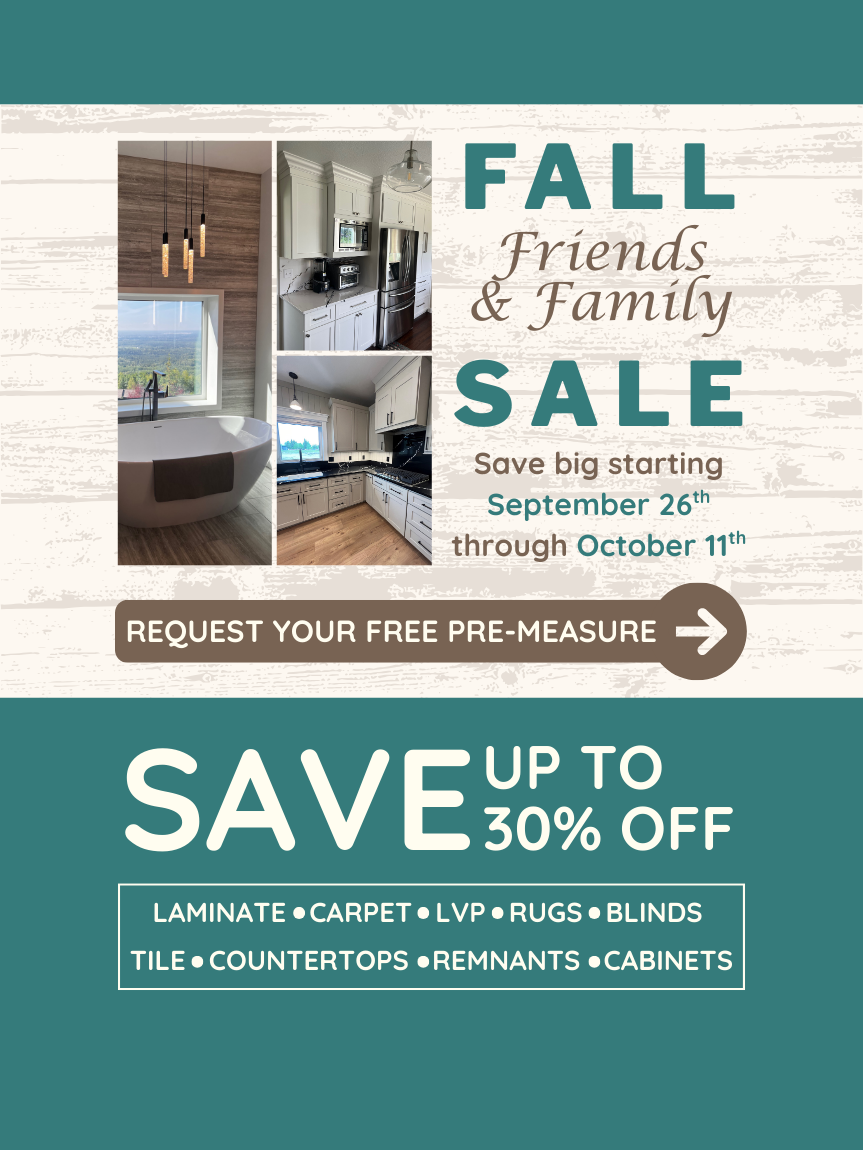 Woman sitting on hardwood floor online shopping with laptop on phone.